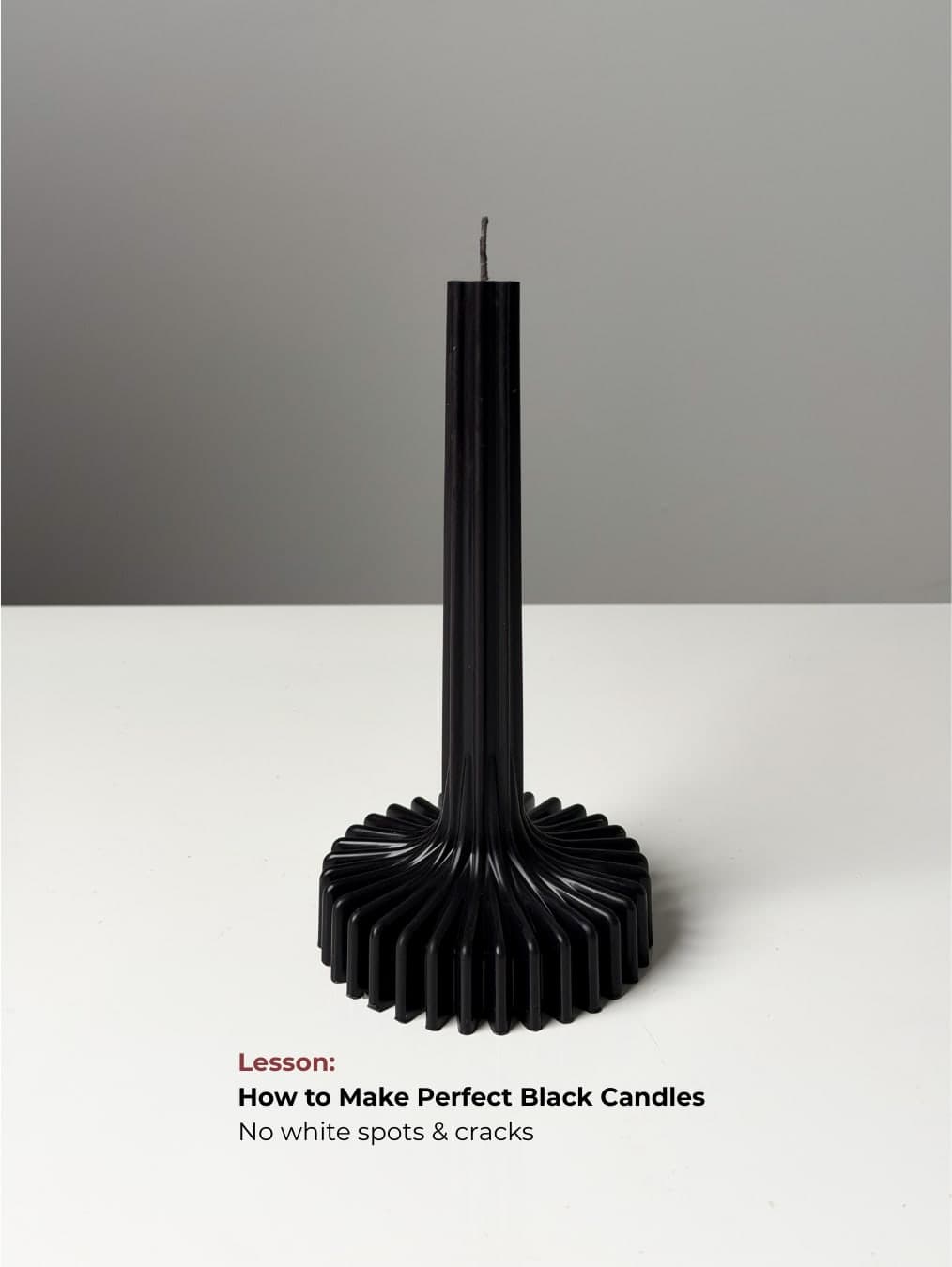Perfect black pillar candle without white spots